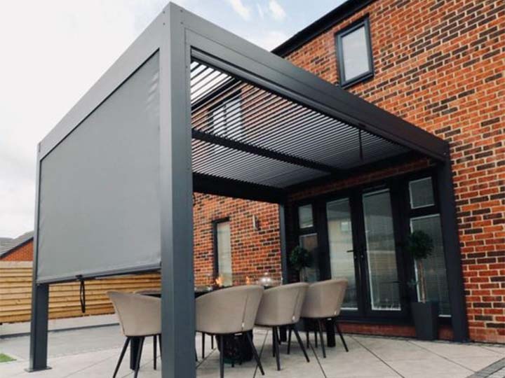 B- Aluminum pergola fixed to the house wall.
